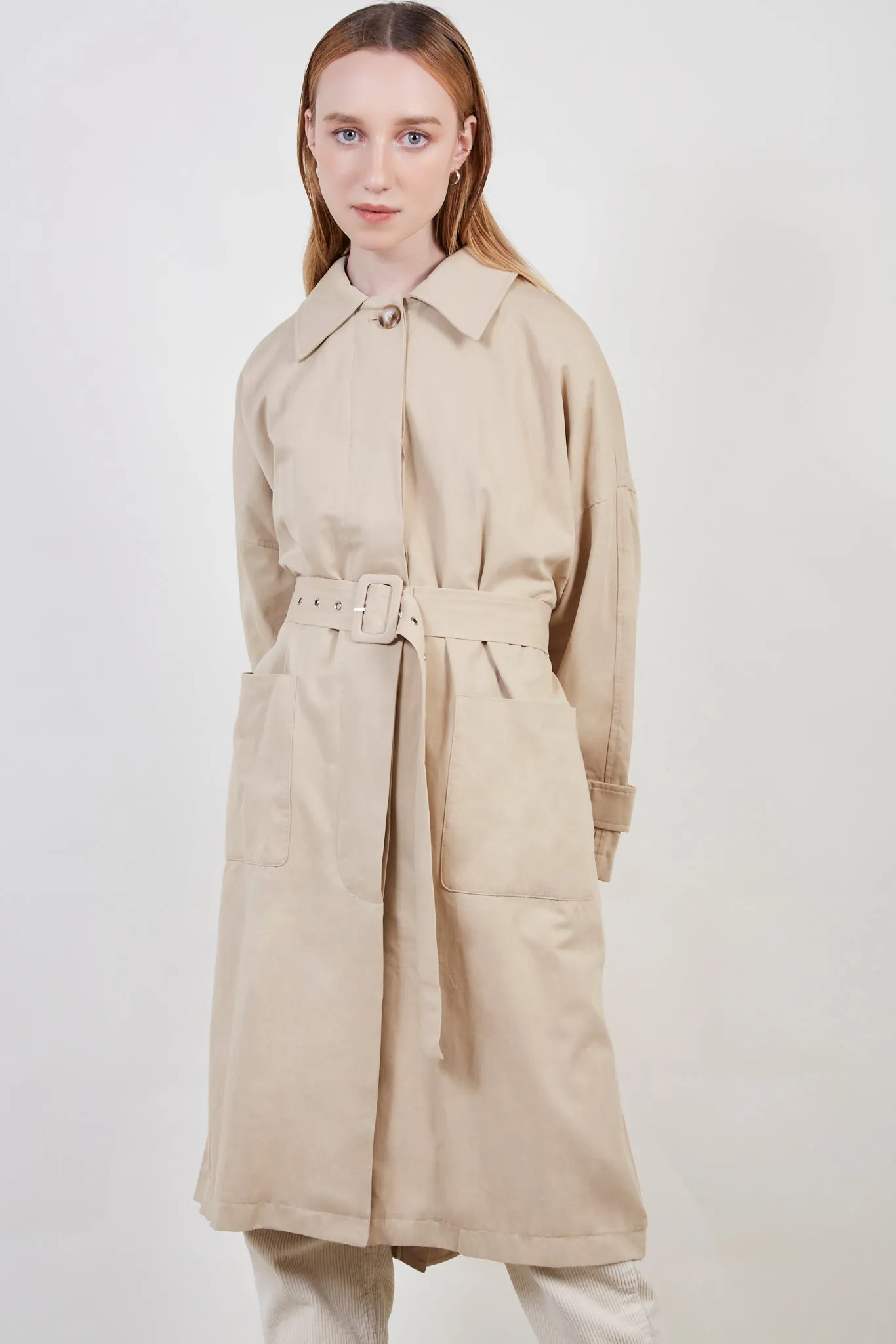 Beige concealed back button trench coat
