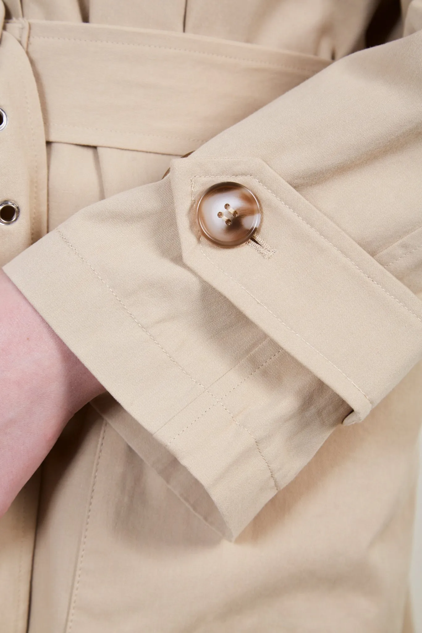 Beige concealed back button trench coat