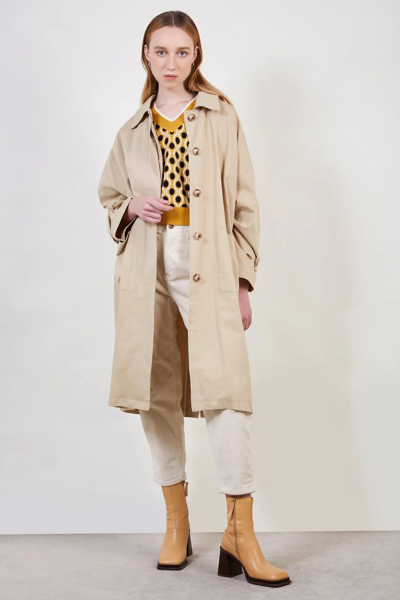 Beige concealed back button trench coat