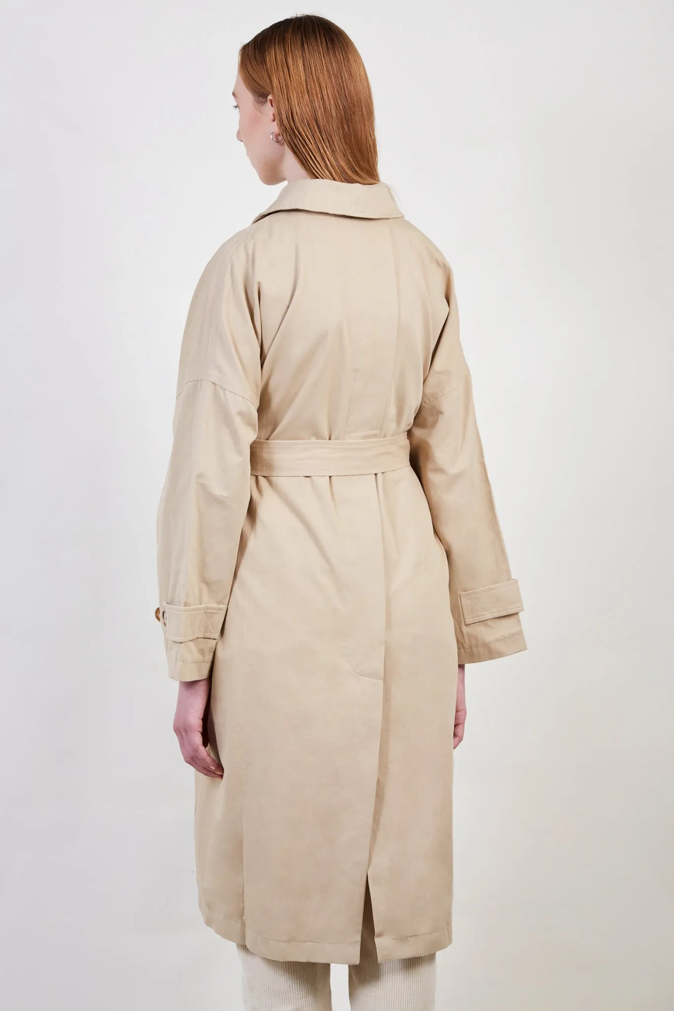 Beige concealed back button trench coat