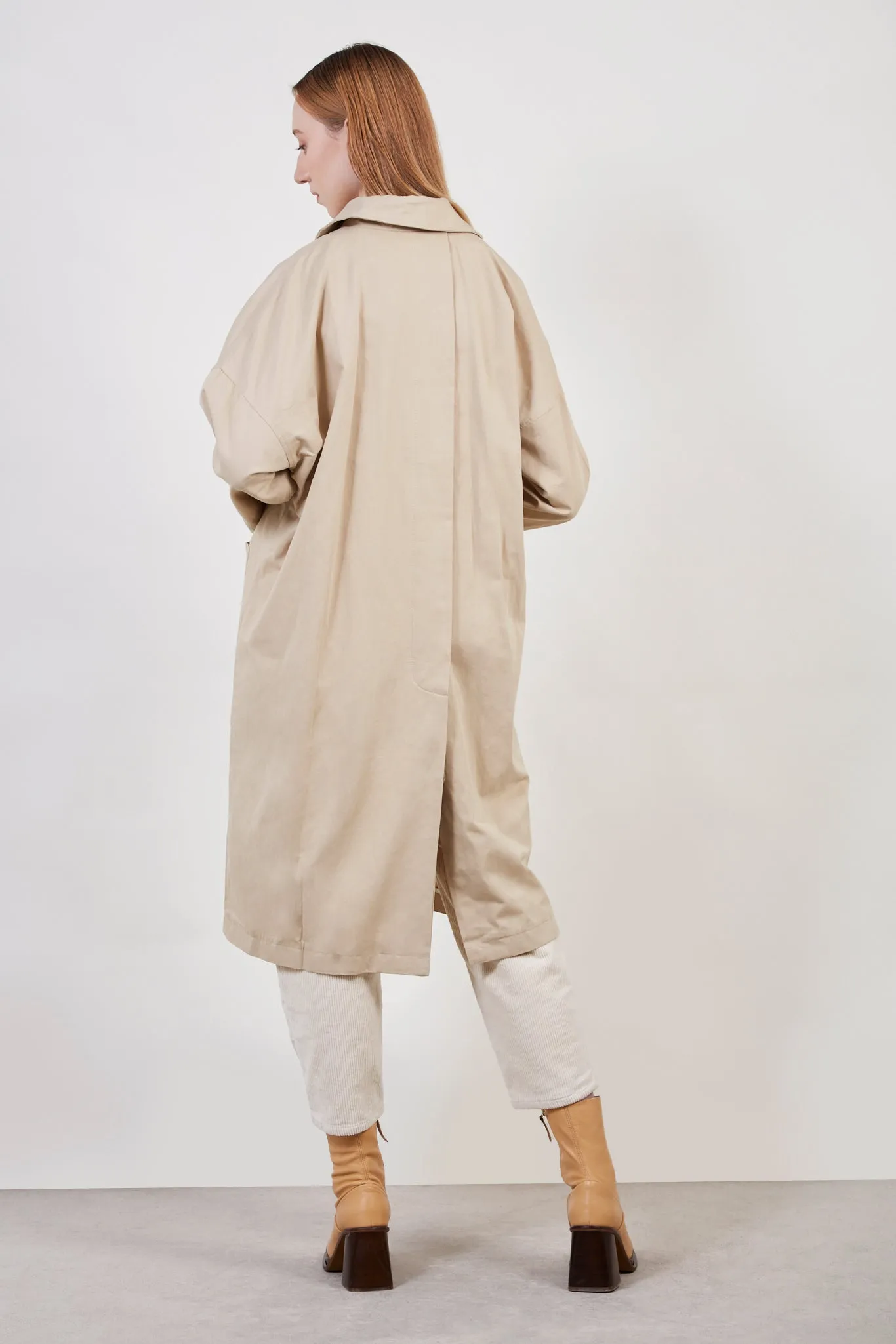 Beige concealed back button trench coat