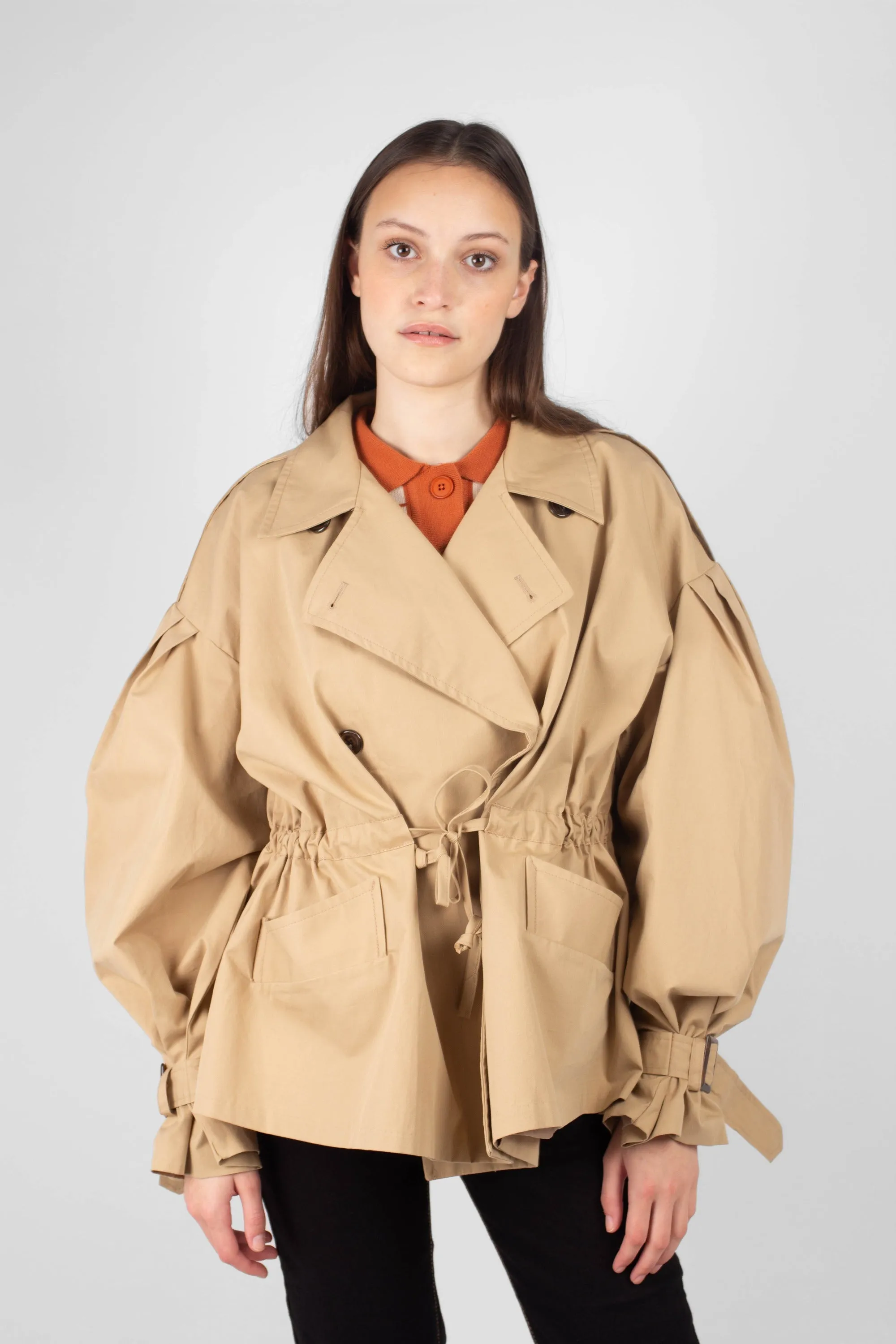 Beige double breasted half length trench coat