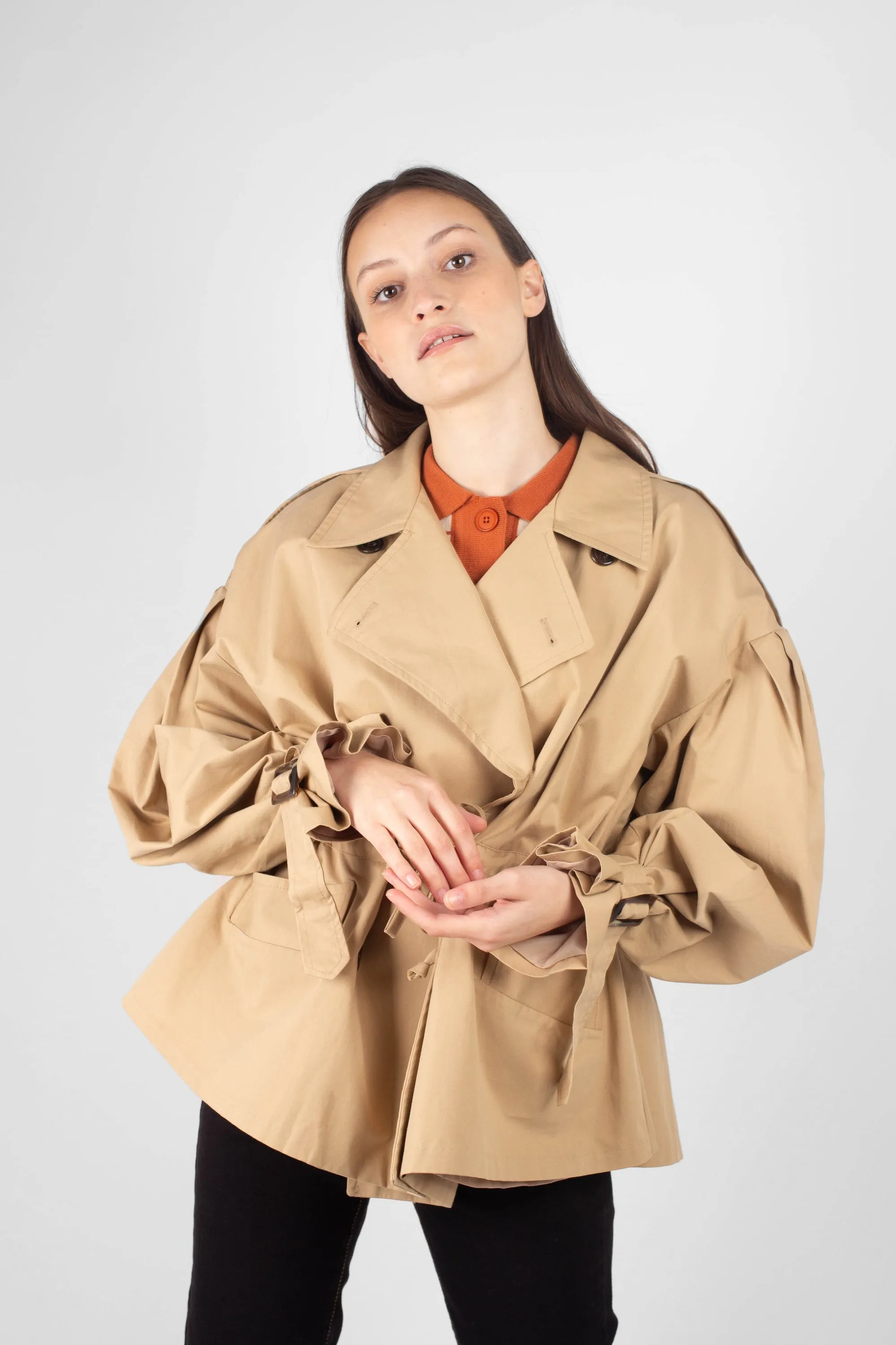 Beige double breasted half length trench coat