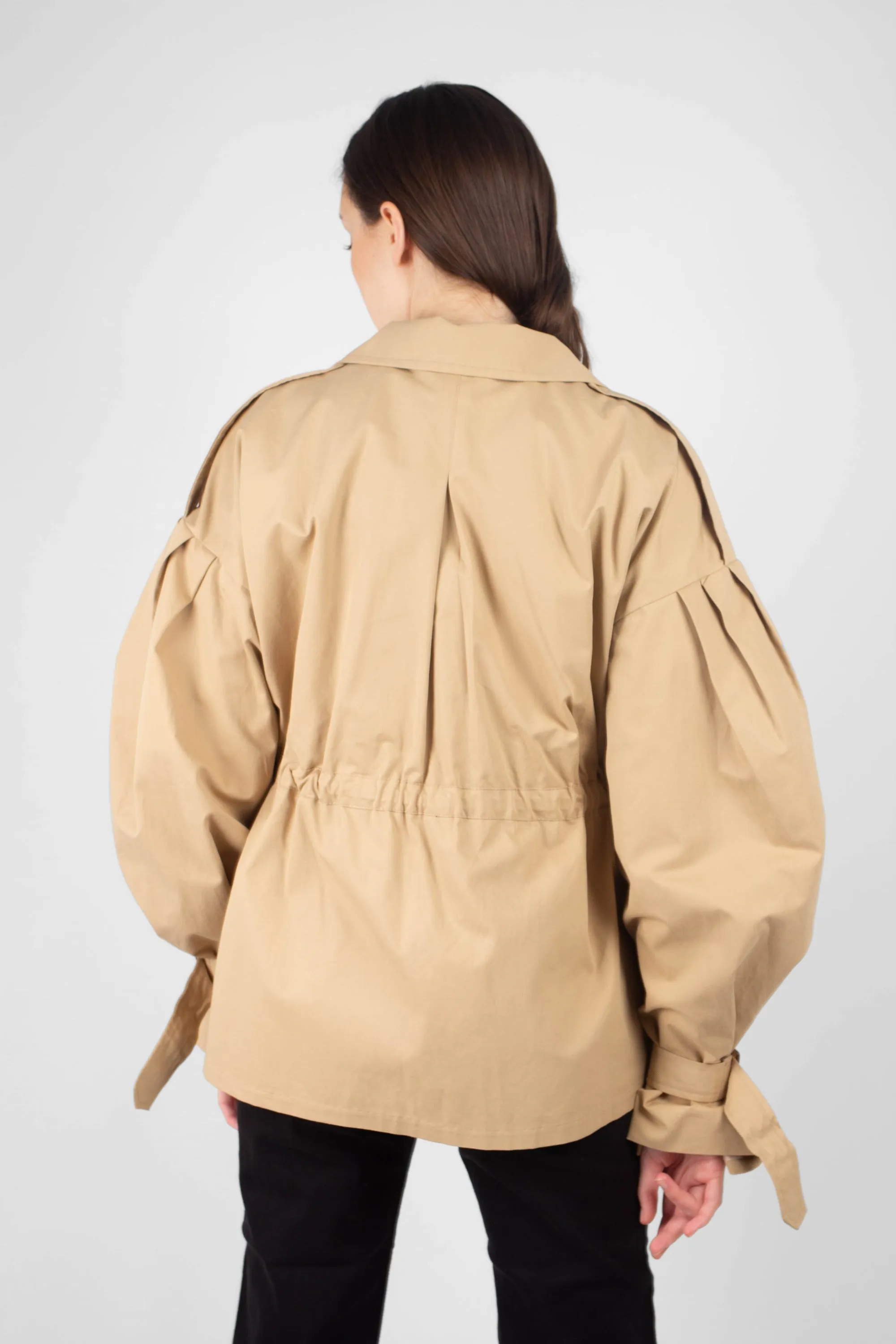 Beige double breasted half length trench coat